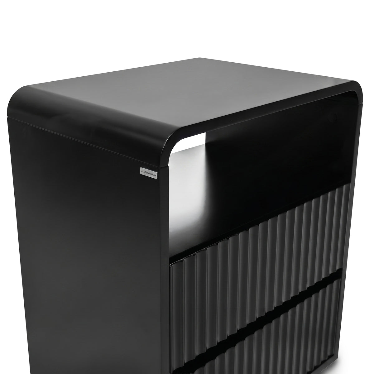 Modern black storage unit with rounded top and grooved lower section on white background