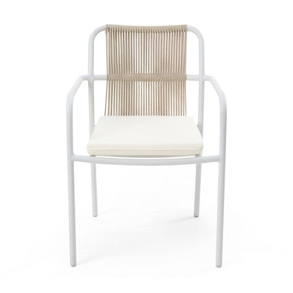 Evone 4 Seater Stone Outdoor Dining Table Set features a minimalist chair with a white metal frame, natural-tone woven backrest, and cream cushion, perfect for stylish alfresco dining.