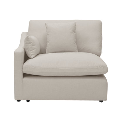 Beige upholstered corner chair on white background