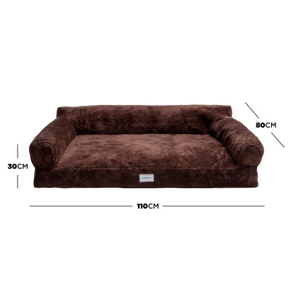 Brown bolster dog bed with dimensions marked on white background