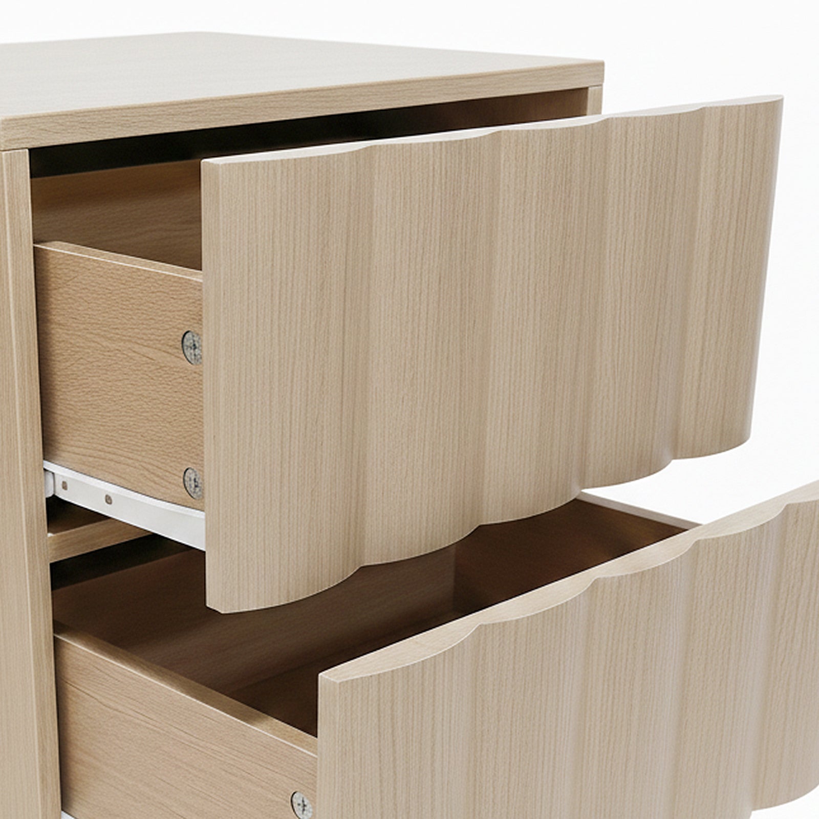 Close-up of two partially open drawers of a wooden chest on white background