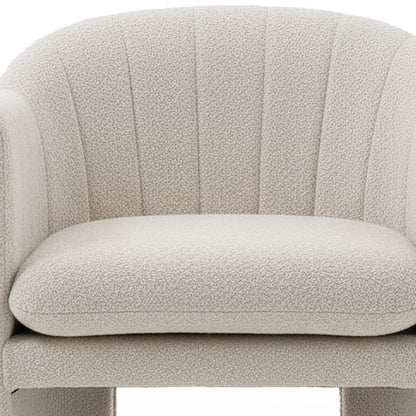 Liora Bouclé Curved Accent Armchair in Beige features a loop-textured upholstery with a curved backrest and plush seat cushion, designed for comfort and modern style in living spaces.