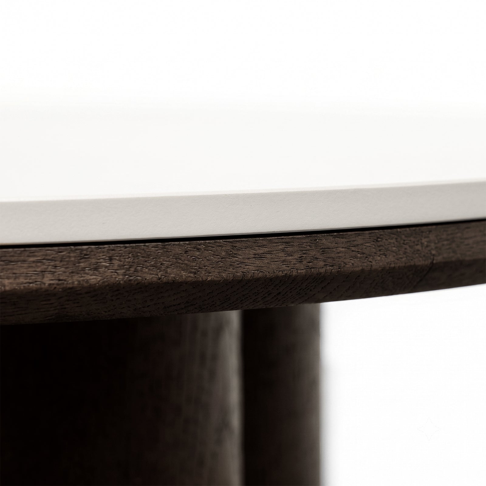 Close-up of the edge and base of a modern table