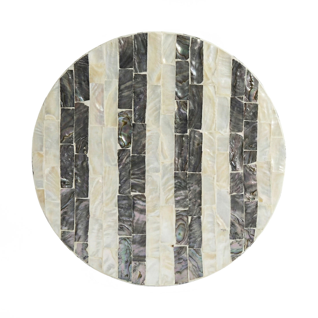 Round decorative plate of mosaic shell segments on white background