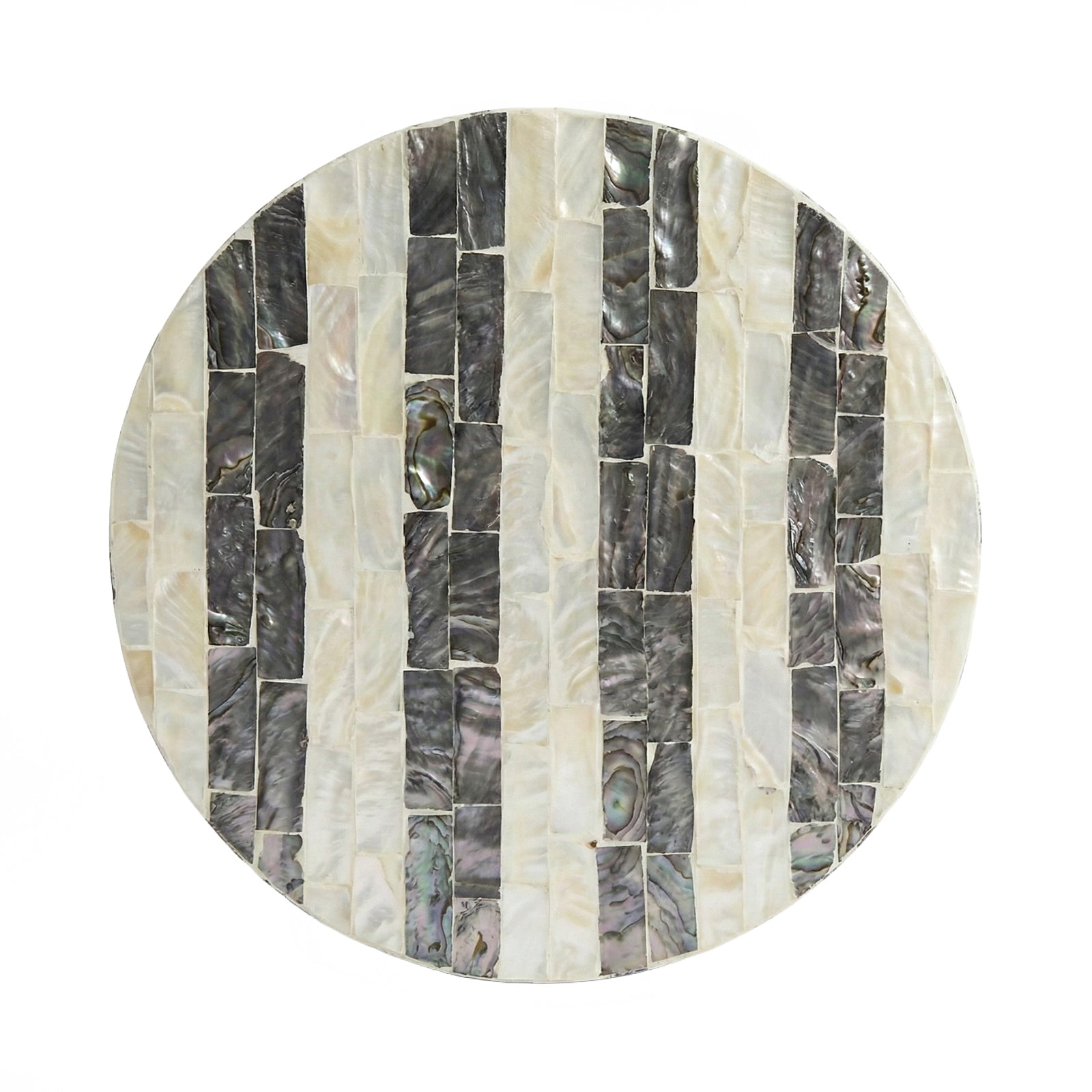 Round decorative plate of mosaic shell segments on white background