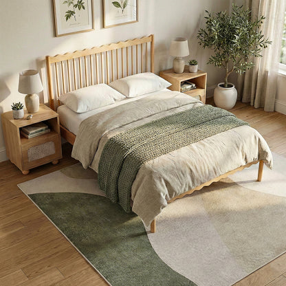 Styled bedroom with wooden bed frame, green and cream bedding, nightstands, and plants
