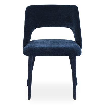 Modern accent chair in dark blue velvet on a white background, front view