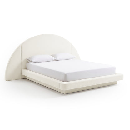 Complete upholstered bed with pillows on a plain white background
