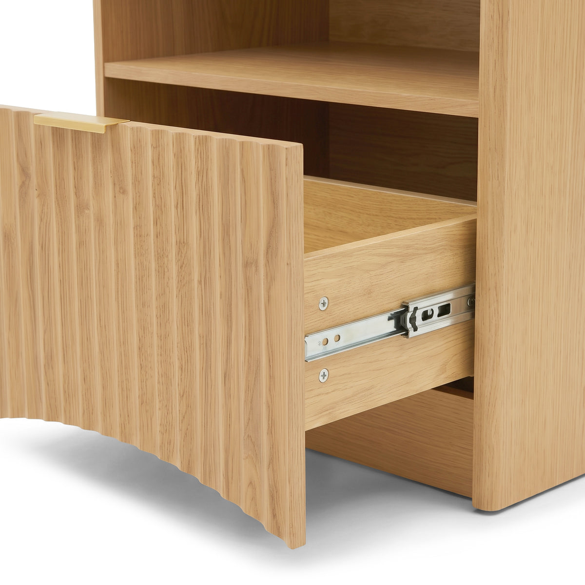 Close angled view of a wooden cabinet with an open drawer showing the slide mechanism.