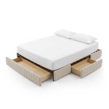 Beige upholstered bed with open storage drawers on white background