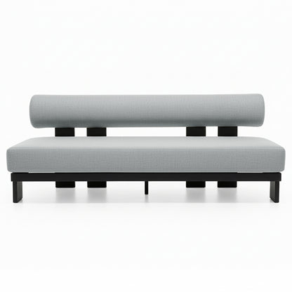 The Modica 5 Seater Aluminium Outdoor Sofa Set in Black & Grey features a minimalist two-seat bench with a black base, straight legs, and light-gray upholstered cushion with a cylindrical bolster backrest.