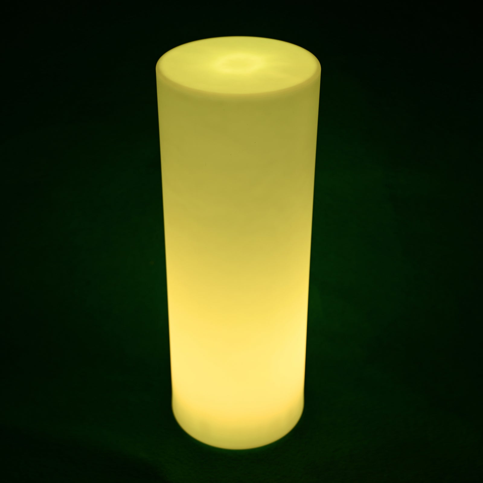 70cm Outdoor Solar LED Bollard Light glowing warmly, standing upright with a sleek cylindrical design, set against a dark backdrop, highlighting its inviting, resort-style aesthetic for outdoor spaces.