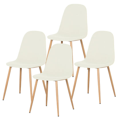 Four modern dining chairs on a white background