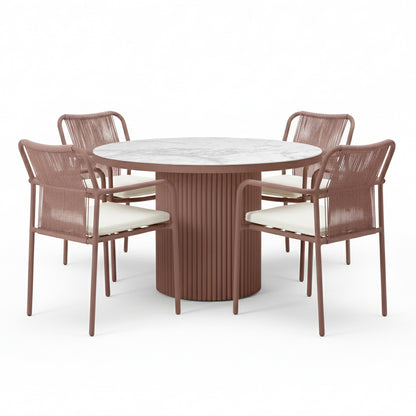 Evone 4 Seater Stone Outdoor Dining Table Set in Terracotta features a round marble-look tabletop and four armchairs with woven backrests and light cushions, perfect for stylish alfresco dining.