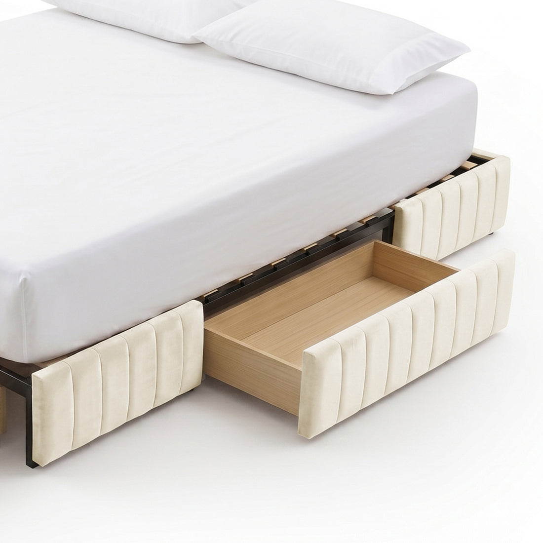 Partial view of upholstered bed base with storage drawer pulled out on white background