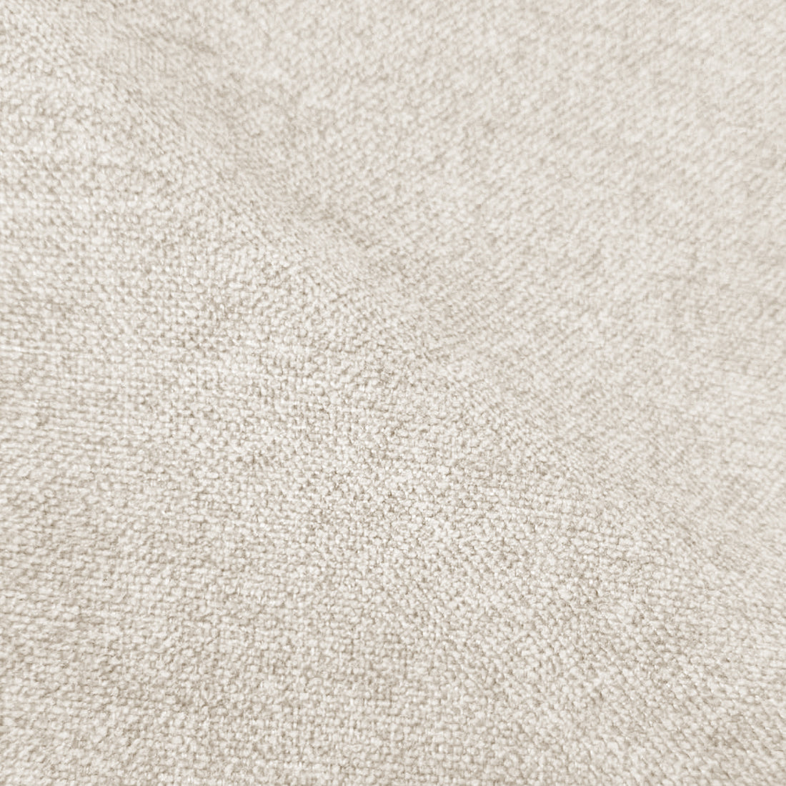 Macro close-up of light cream woven upholstery fabric