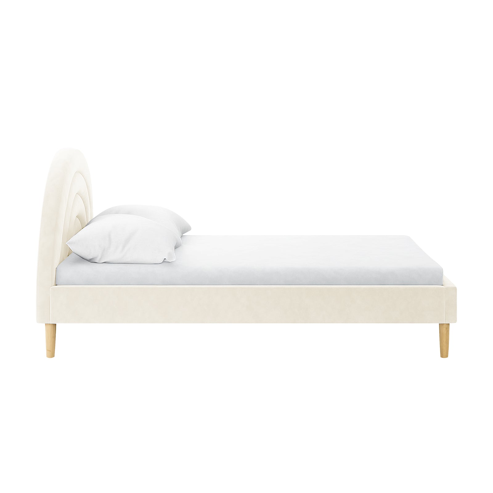 Estilla Velvet Rainbow Bed in Beige features a semi-circular velvet headboard, low-profile upholstered frame, and light-wood tapered legs, with a mattress and pillow on top.