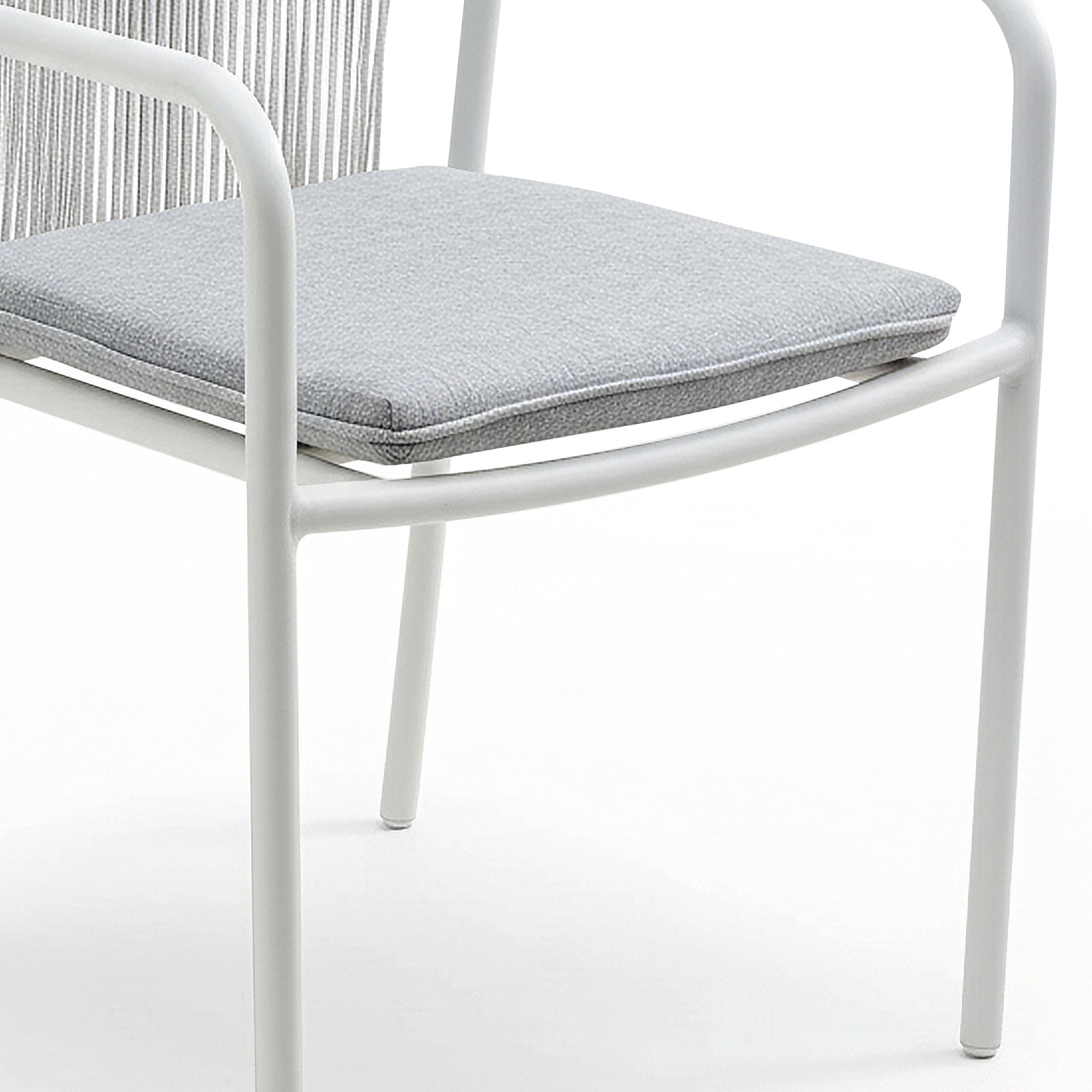Evone Aluminium Rope Outdoor Dining Chair in Light Grey features a white metal frame with straight tubular legs, a light-gray upholstered seat cushion, and a partially visible rope-woven backrest, showcasing modern, coastal design.