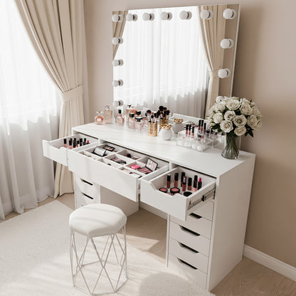 Jenna Hollywood LED Mirror Dressing Table in White featuring a large mirror with LED bulbs, clear and rose-gold organizers, storage drawers, a cushioned stool, and fresh white roses on the tabletop.