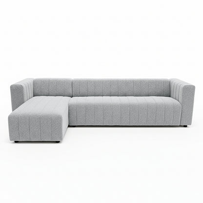 Parisa 4 Seater Tufted Boucle Sofa with Chaise in Light Grey, featuring plush bouclé upholstery, deep seats, and a left-side chaise. Modern, tufted design ideal for comfortable, family-sized lounging.