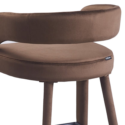 Close-up of curved brown upholstered seat and backrest of bar stool