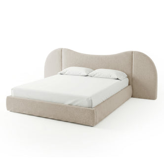 Modern upholstered bed on white background