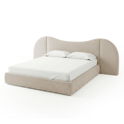 Modern upholstered bed on white background