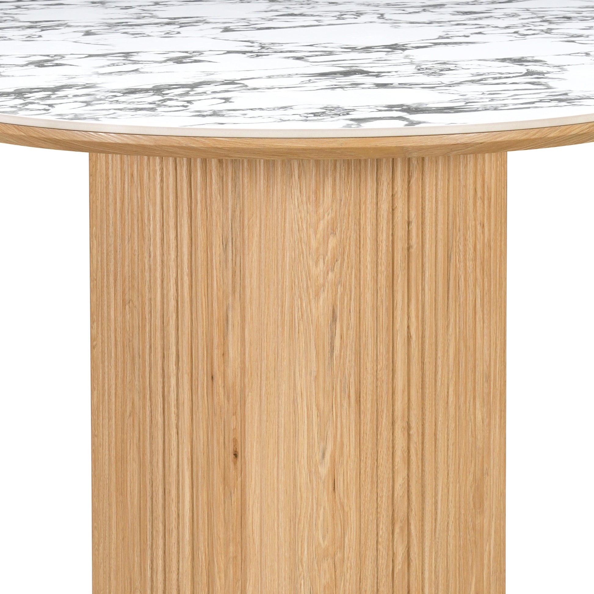 Close-up of marble-effect tabletop and light wood grooved base on a white background