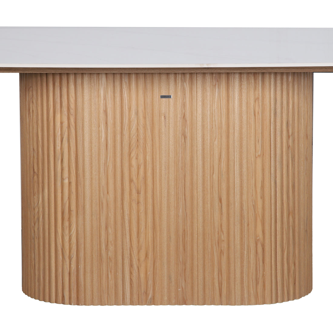 Aeris 180cm Marble Look Dining Table With Wood Base features a curved, fluted-wood base and a smooth white top, embodying a mid-century-modern aesthetic ideal for dining or reception areas.