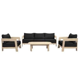 Elani 5 Seater Acacia Hardwood Outdoor Sofa Set in Black features a light wood-framed three-seat sofa and two armchairs with black cushions, paired with a matching low rectangular coffee table.