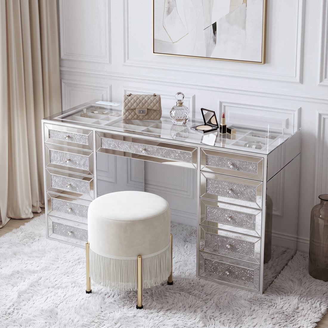 Mirrored vanity desk with stool in a styled bedroom setting