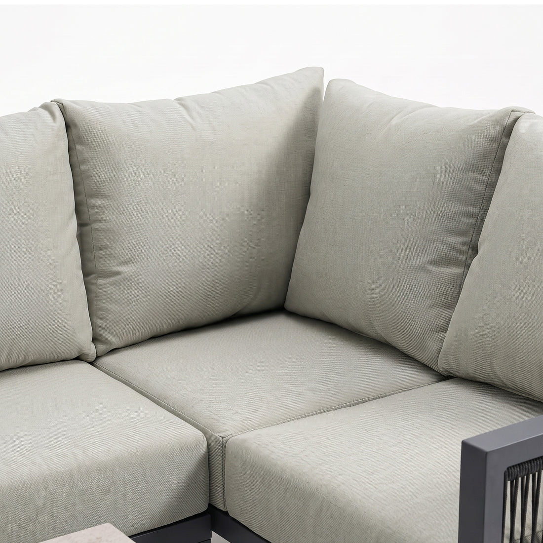 Corner section of a modular sofa on white background