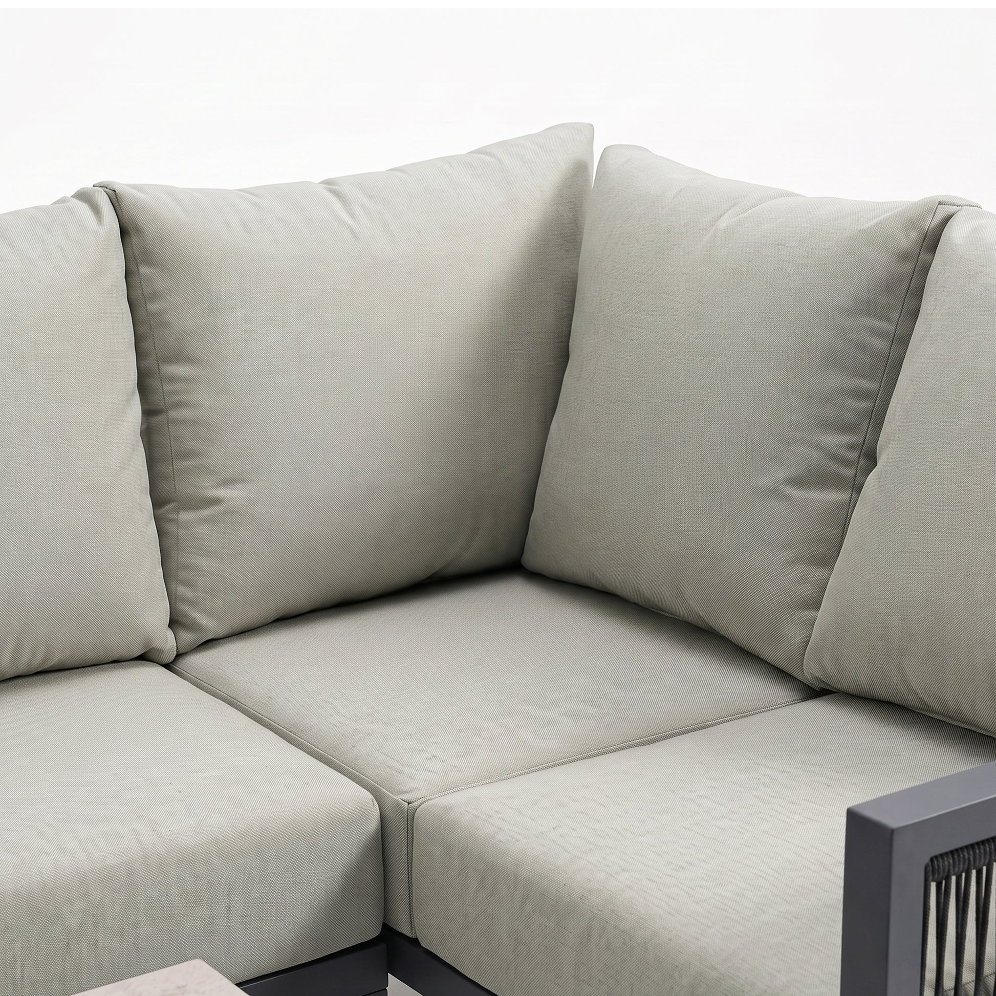Corner section of a modular sofa on white background