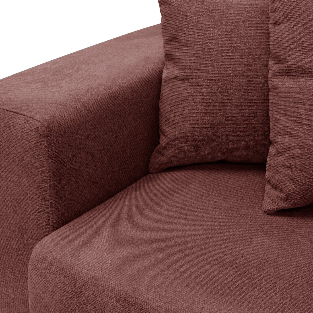 Close-up of sofa armrest and seat area in reddish-brown fabric on white background