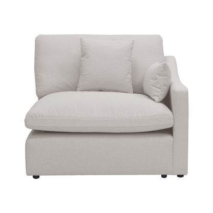 Light beige upholstered modular chair with armrest and cushions on a white background