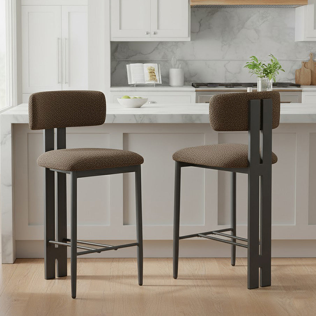 Haleo Curved Boucle Fabric Barstool Set of 2 in Rust Brown features plush textured seats and arched backrests on dark-metal frames, positioned in a modern kitchen scene with a white marble island.