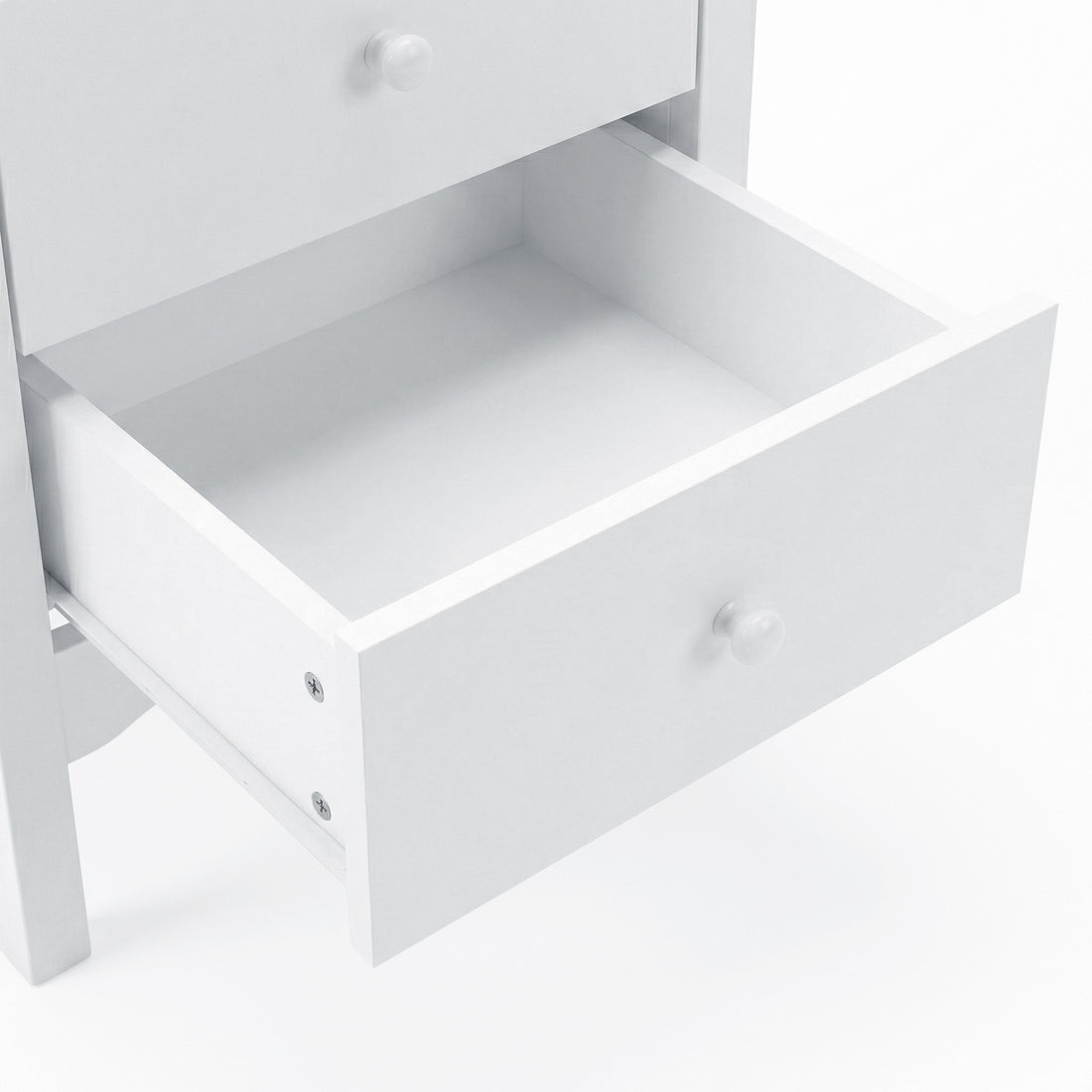 Zoomed-in view of the interior of a white drawer on a white background