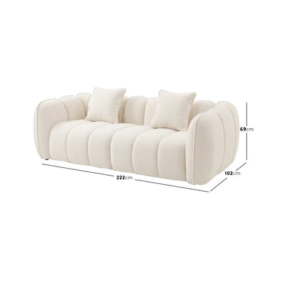 Modern tufted cream sofa with dimension labels displayed on a white background