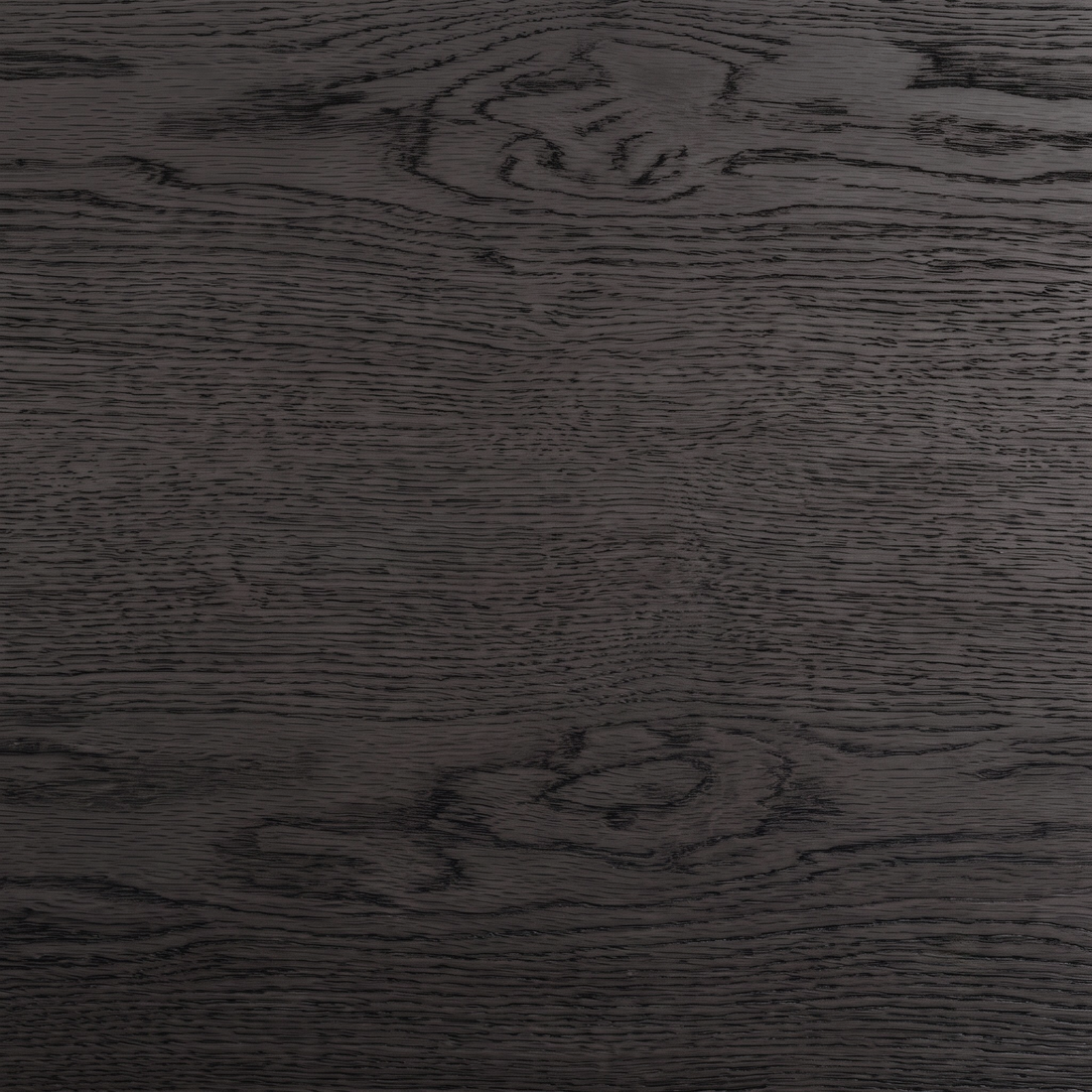 Close-up of dark wood grain texture on the product surface
