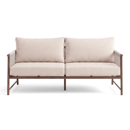 Two-seater sofa with beige cushions on white background