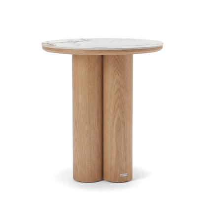 Contemporary round side table with a stone-look top and two cylindrical wooden legs on a white background