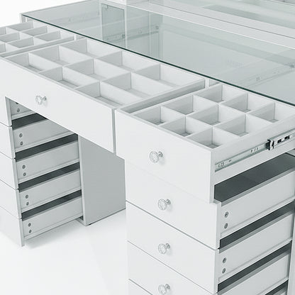 Close view of vanity drawers and glass top on white background