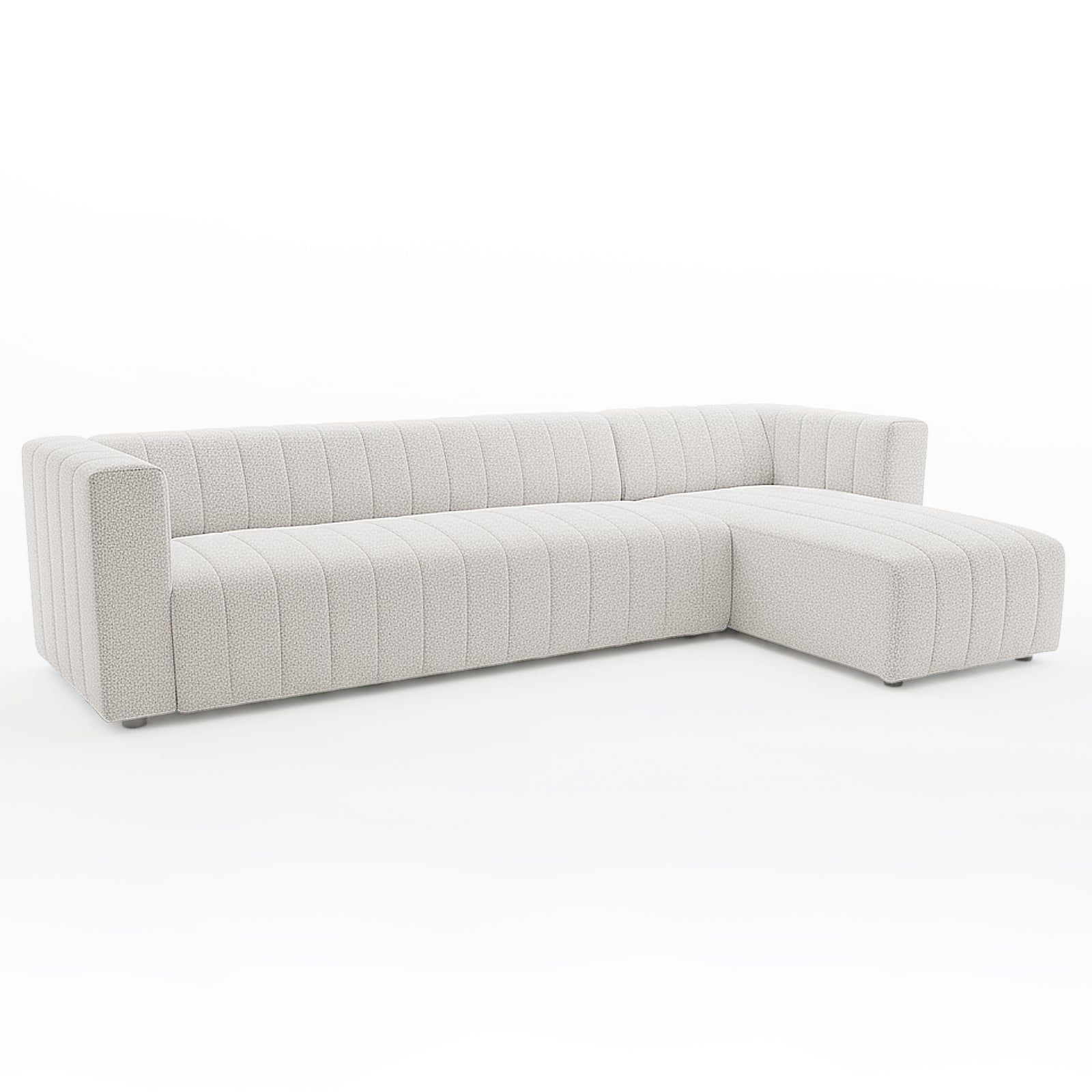 Parisa 4 Seater Tufted Boucle Sofa with Chaise in Cream White features an L-shaped design, light boucle fabric, vertical channel tufting, and low-profile, nearly concealed feet for a minimalist aesthetic.