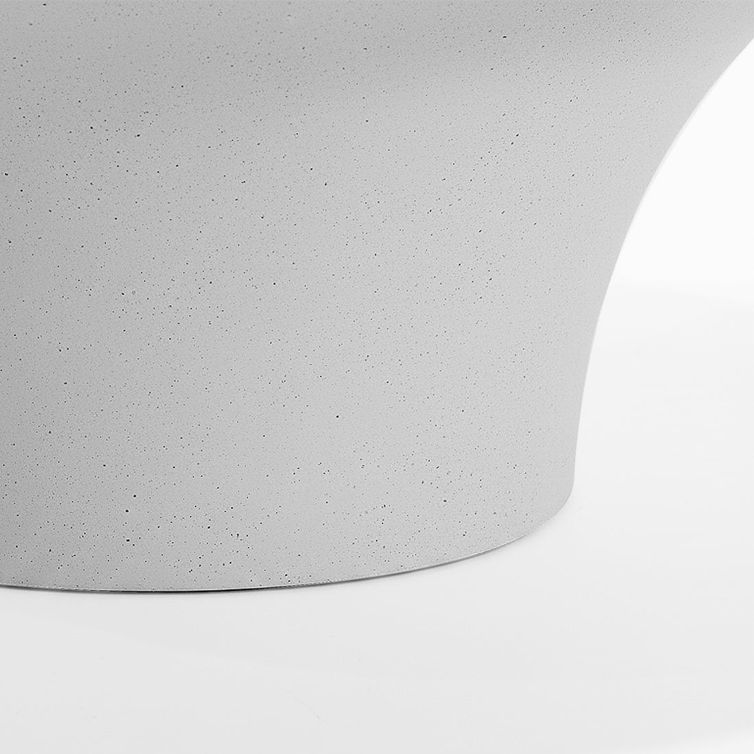 Close-up of coffee table base detail on white background