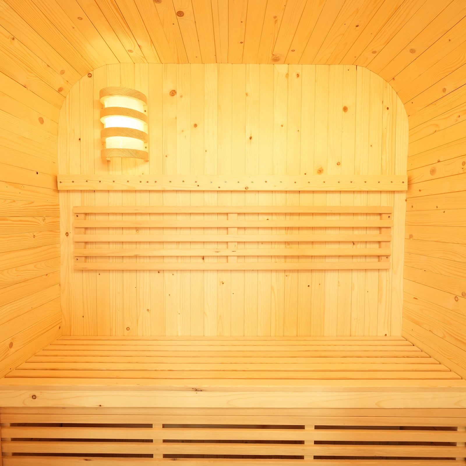Interior of the Waru 3 Person Traditional Finnish Outdoor Sauna in Natural, featuring slatted wood benches, smooth wood-panel walls, and a protective light fixture, embodying classic Finnish sauna design.