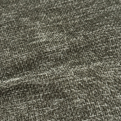 Close-up of woven fabric texture on the bed