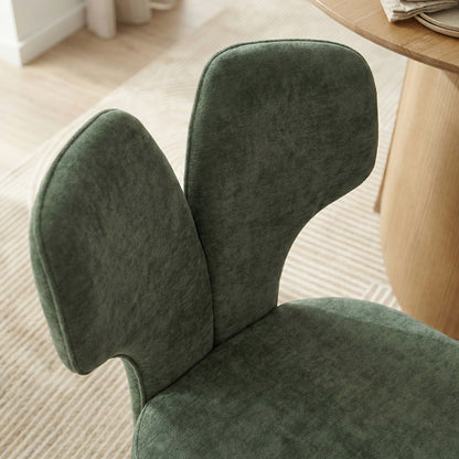 Close-up of chair backrest in a styled room setting