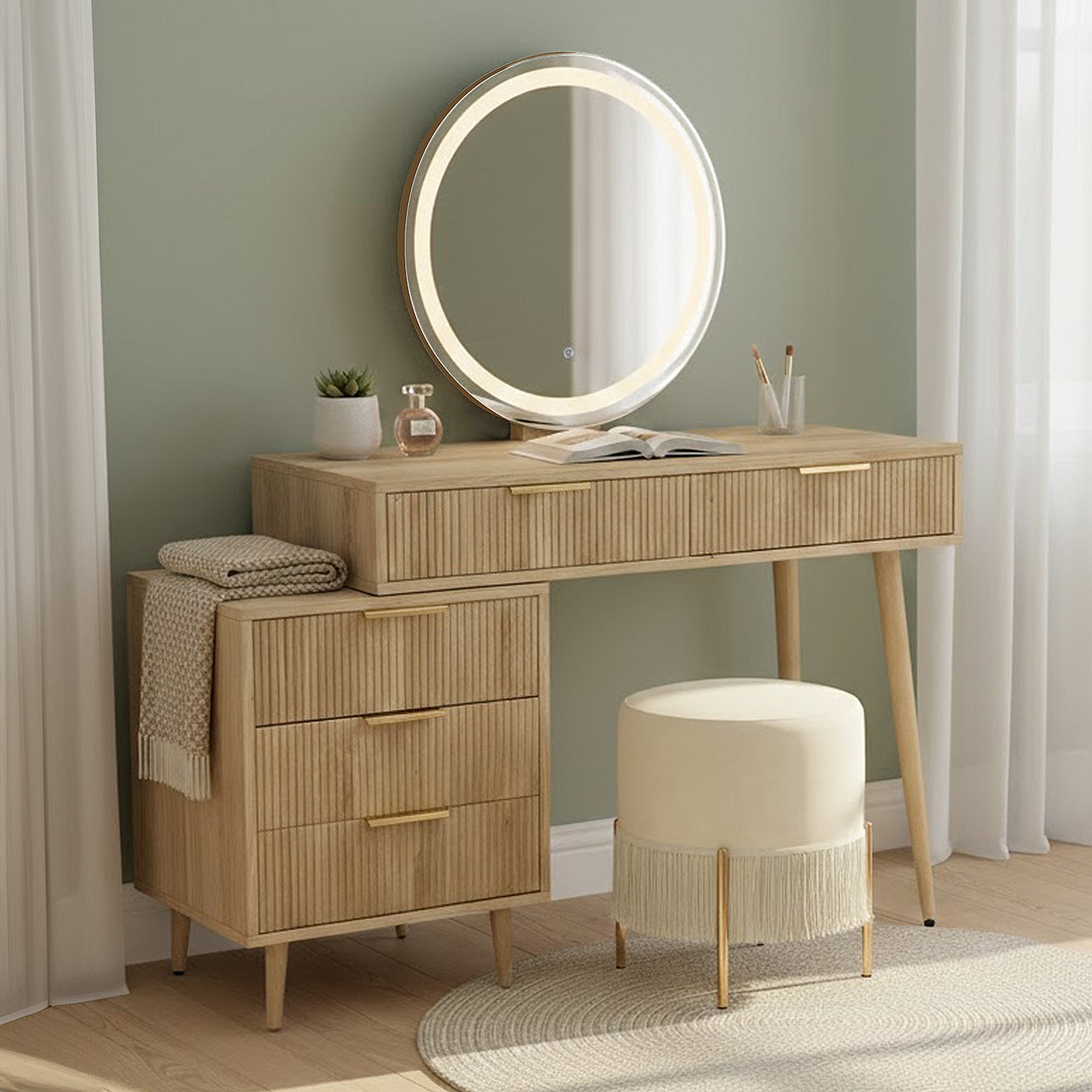 Serenity Dressing Table with Touch Screen Mirror in Natural features a light-wood vanity, LED-lit round mirror, ribbed drawers, and cream stool with gold legs, creating a sleek, organized beauty space.