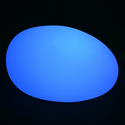 Solar Charging Outdoor LED Rock Light Waterproof Stone Lamp, glowing blue with a smooth, abstract shape against a dark background, illustrating its vibrant illumination feature for garden ambiance enhancement.