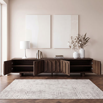 Dark wood sideboard styled in a modern living room